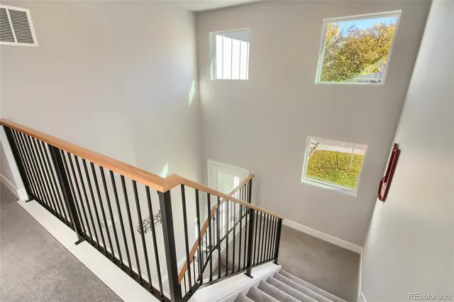 a bathroom with a sink a mirror and a shower