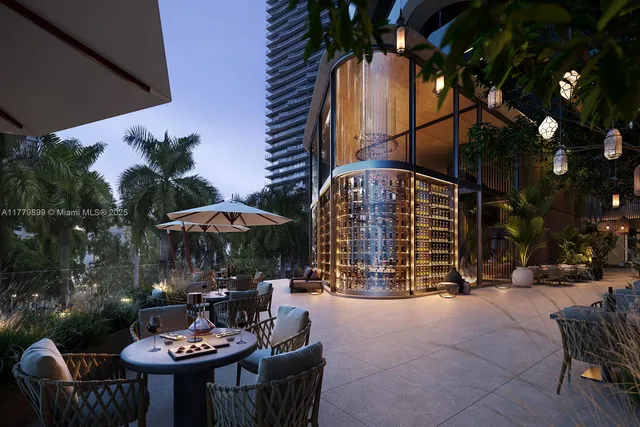 a view of a cafe with sitting area