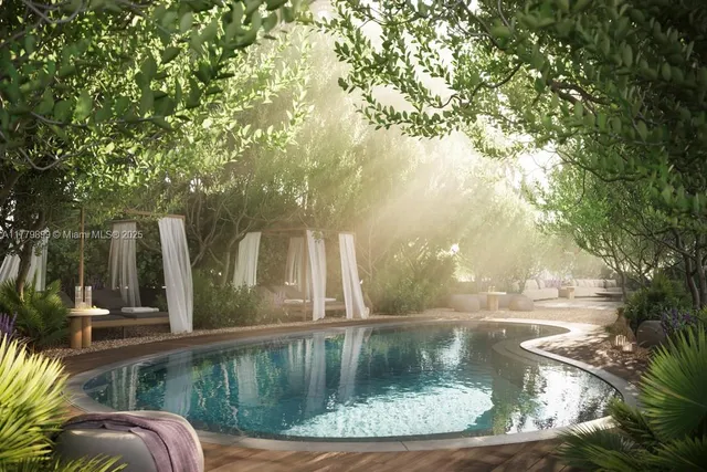 a view of a dining room with furniture and a chandelier