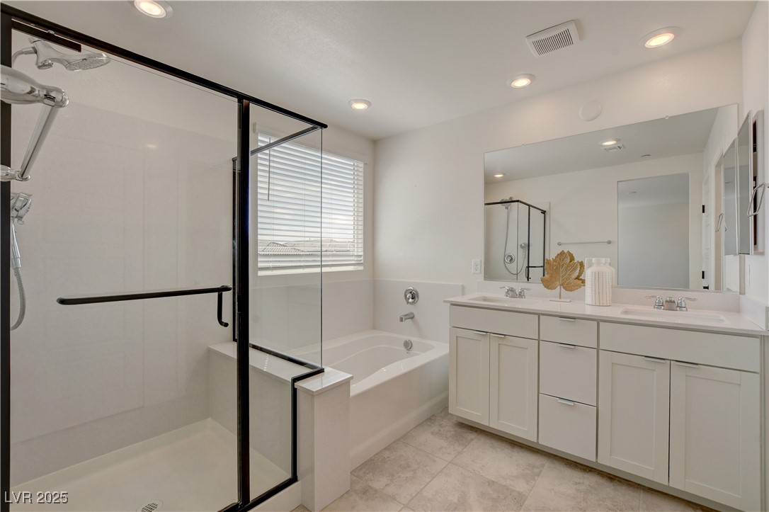 5406 Zacatin Court Las Vegas, NV 89166 - Photo 13 of 23 Full bathroom featuring a garden tub, visible vent