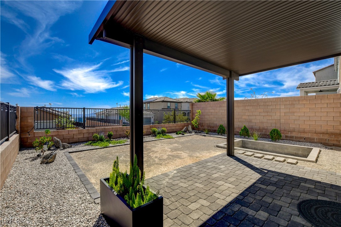 5406 Zacatin Court Las Vegas, NV 89166 - Photo 20 of 23 View of patio featuring a fenced backyard