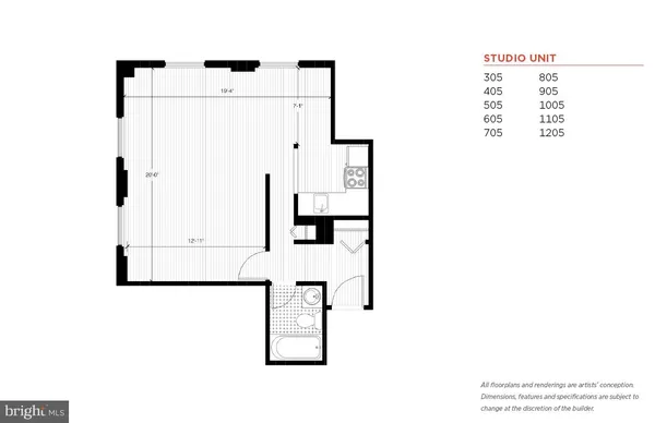 an empty room with wooden floor and window