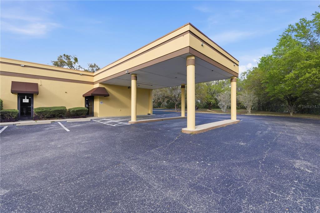 7535 Southwest 62nd Court, Unit B Ocala, FL 34476 - Photo 22 of 25 front view of house with a yard
