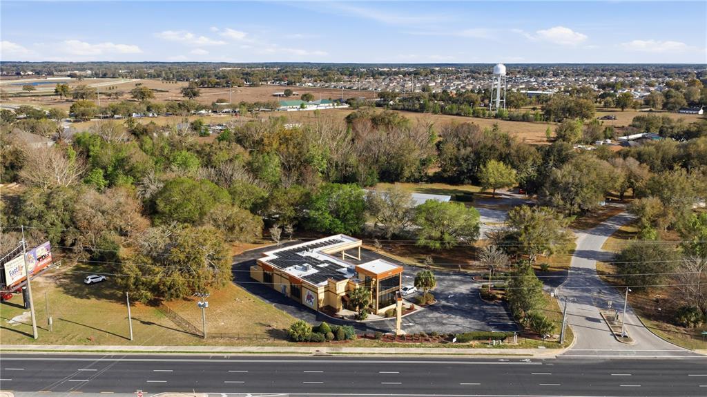 7535 Southwest 62nd Court, Unit B Ocala, FL 34476 - Photo 8 of 25 an aerial view of a house with a yard