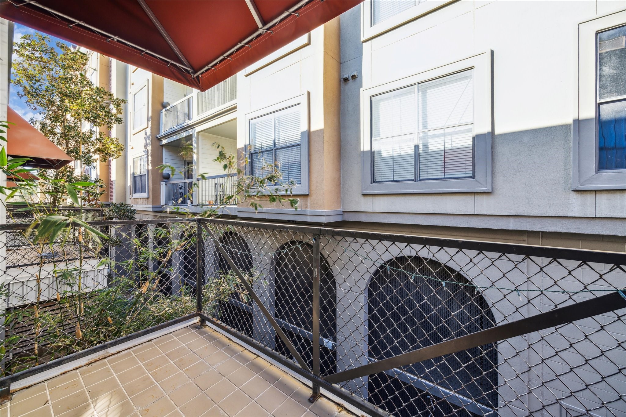 6111 Gehring Street Houston, TX 77021 - Photo 16 of 16 a view of balcony with wooden floor