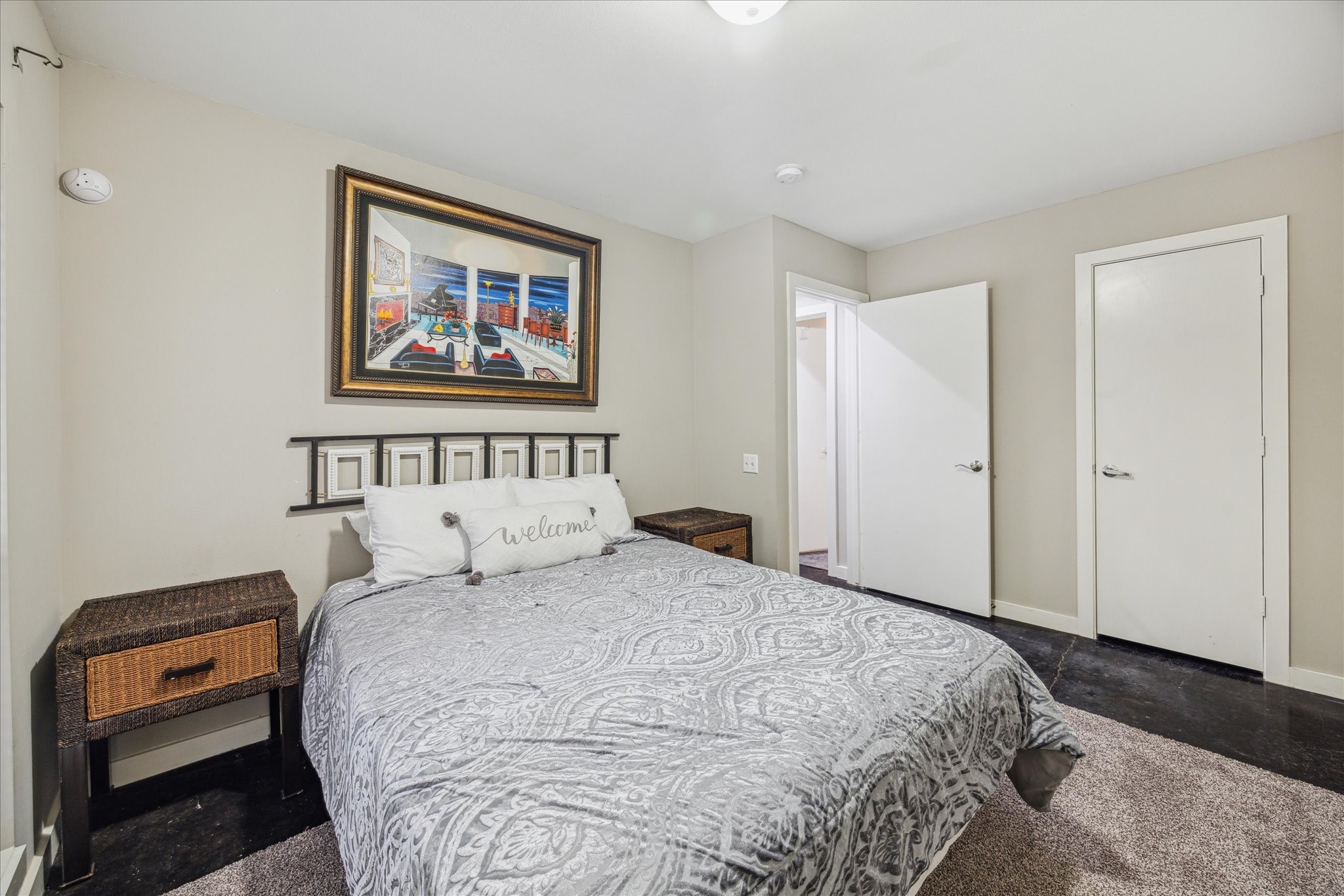 6111 Gehring Street Houston, TX 77021 - Photo 4 of 16 a bedroom with a bed and a painting on the wall