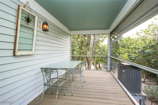 a view of a chairs on the roof deck