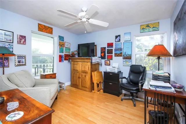 a workspace with furniture and window