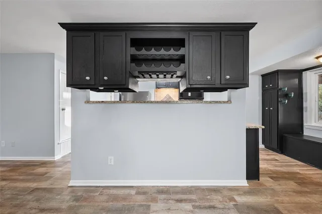 a view of a kitchen with a sink