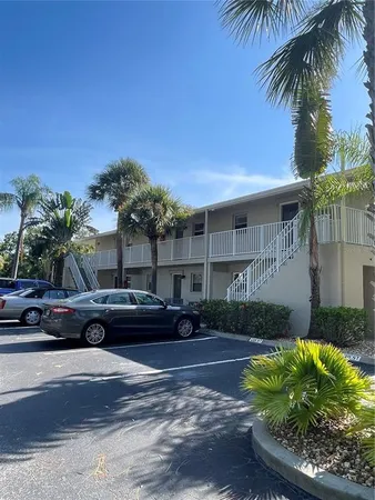 a cars parked in front of a house