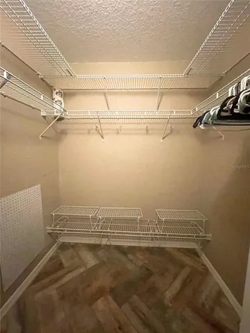 a view of a room with racks on the wall