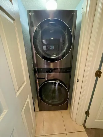 a utility room with a sink and a washer