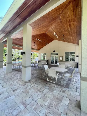 a building outdoor space with a patio outdoor seating and plants