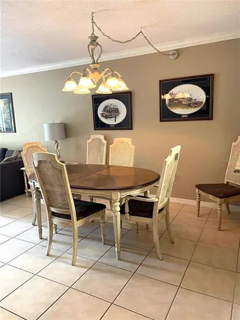 a view of a dining room and kitchen