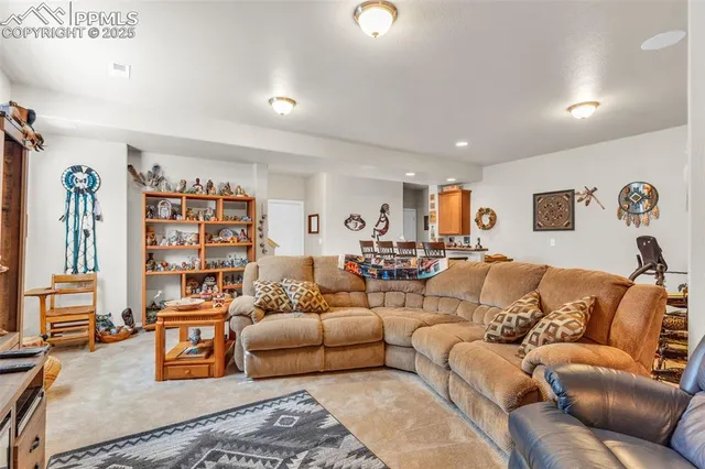 a living room with furniture and a couch