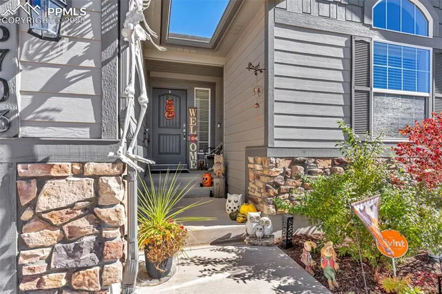 a view of a house with a window and sitting area