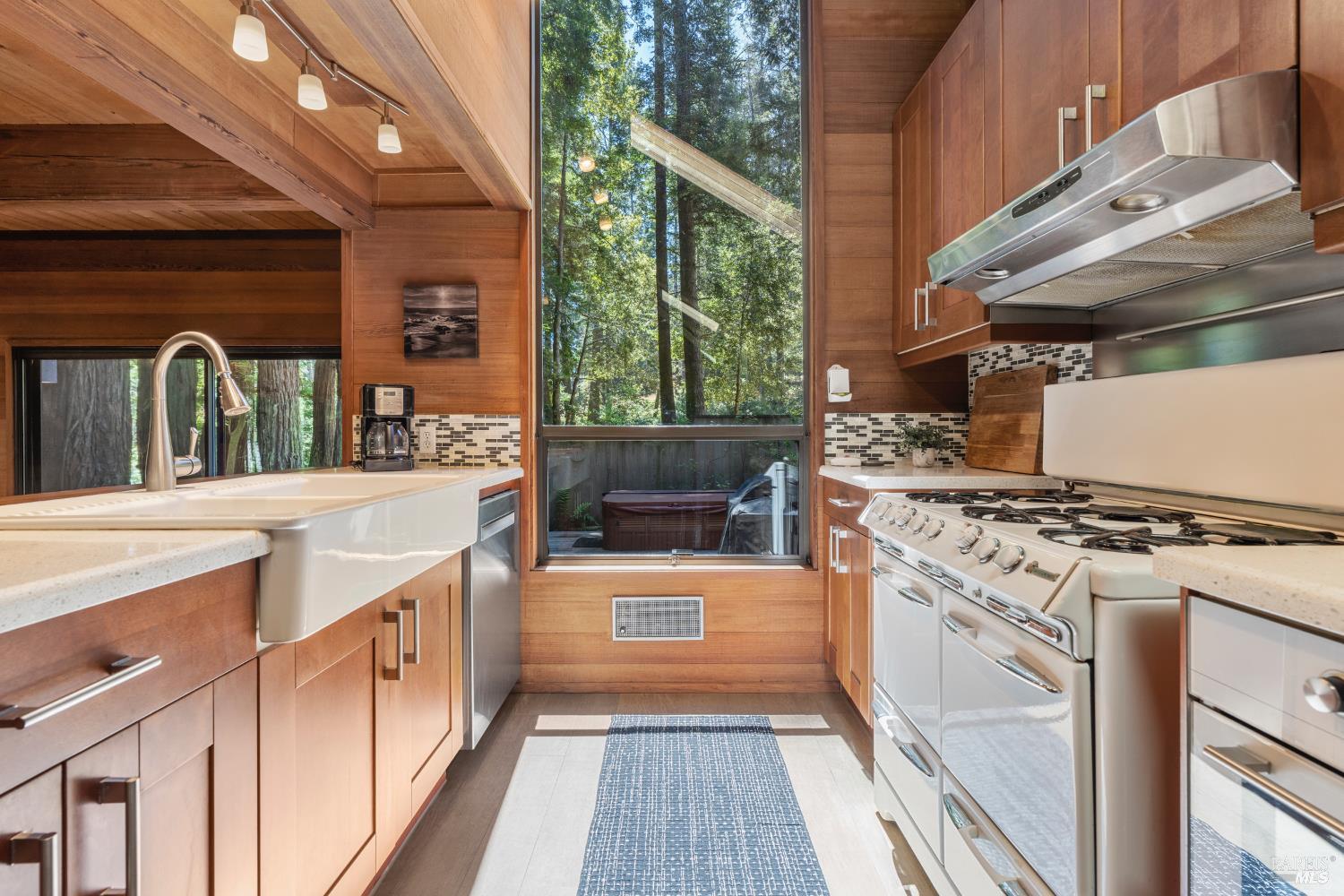 36419 East Ridge Road The Sea Ranch, CA 95497 - Photo 12 of 55 a kitchen with a stove and a refrigerator