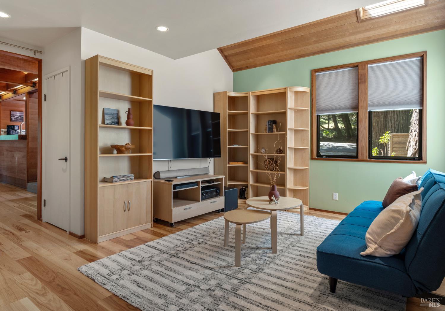 36419 East Ridge Road The Sea Ranch, CA 95497 - Photo 21 of 55 a living room with furniture and a flat screen tv
