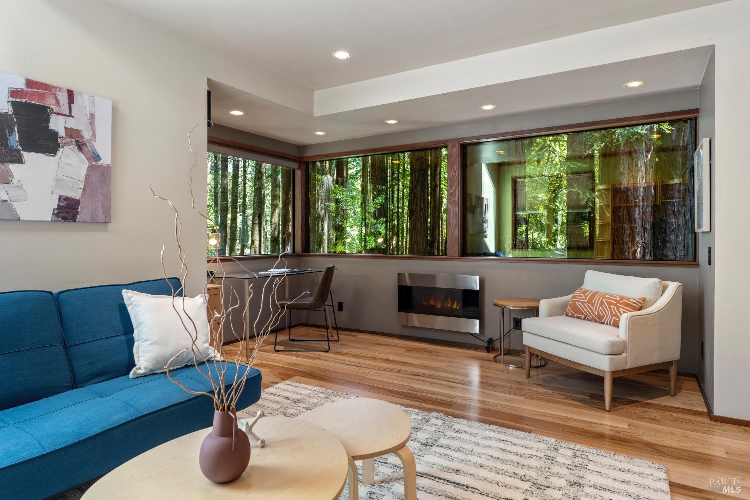 36419 East Ridge Road The Sea Ranch, CA 95497 - Photo 23 of 55 a living room with furniture and a large window