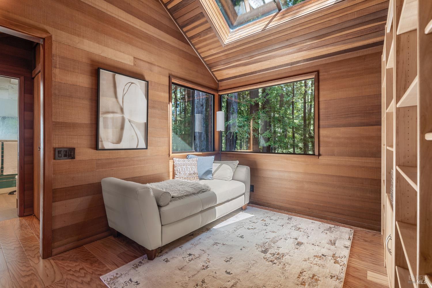 36419 East Ridge Road The Sea Ranch, CA 95497 - Photo 30 of 55 a living room with furniture and a large window
