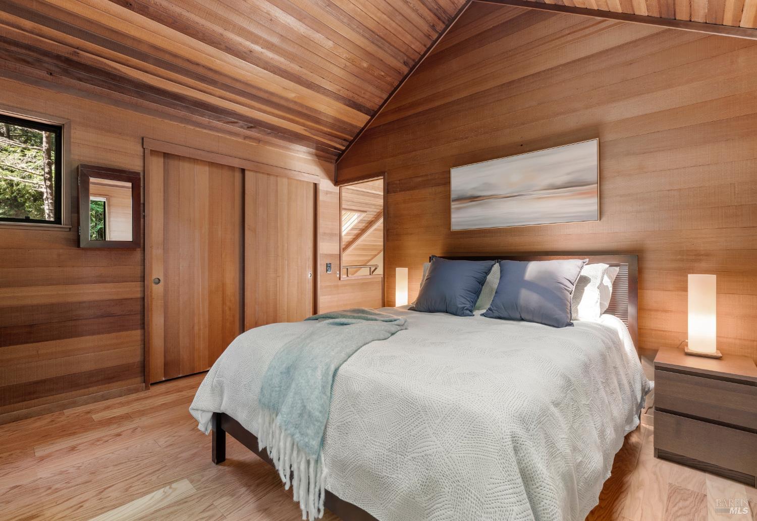 36419 East Ridge Road The Sea Ranch, CA 95497 - Photo 34 of 55 a bed sitting in a bedroom next to a window