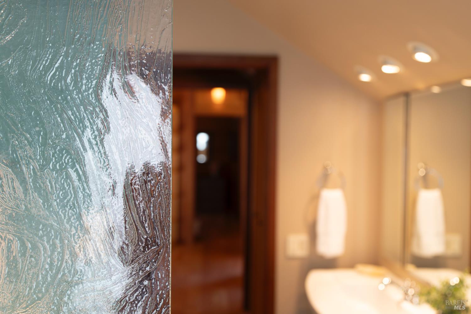 36419 East Ridge Road The Sea Ranch, CA 95497 - Photo 38 of 55 a bathroom with a toilet and a shower curtain