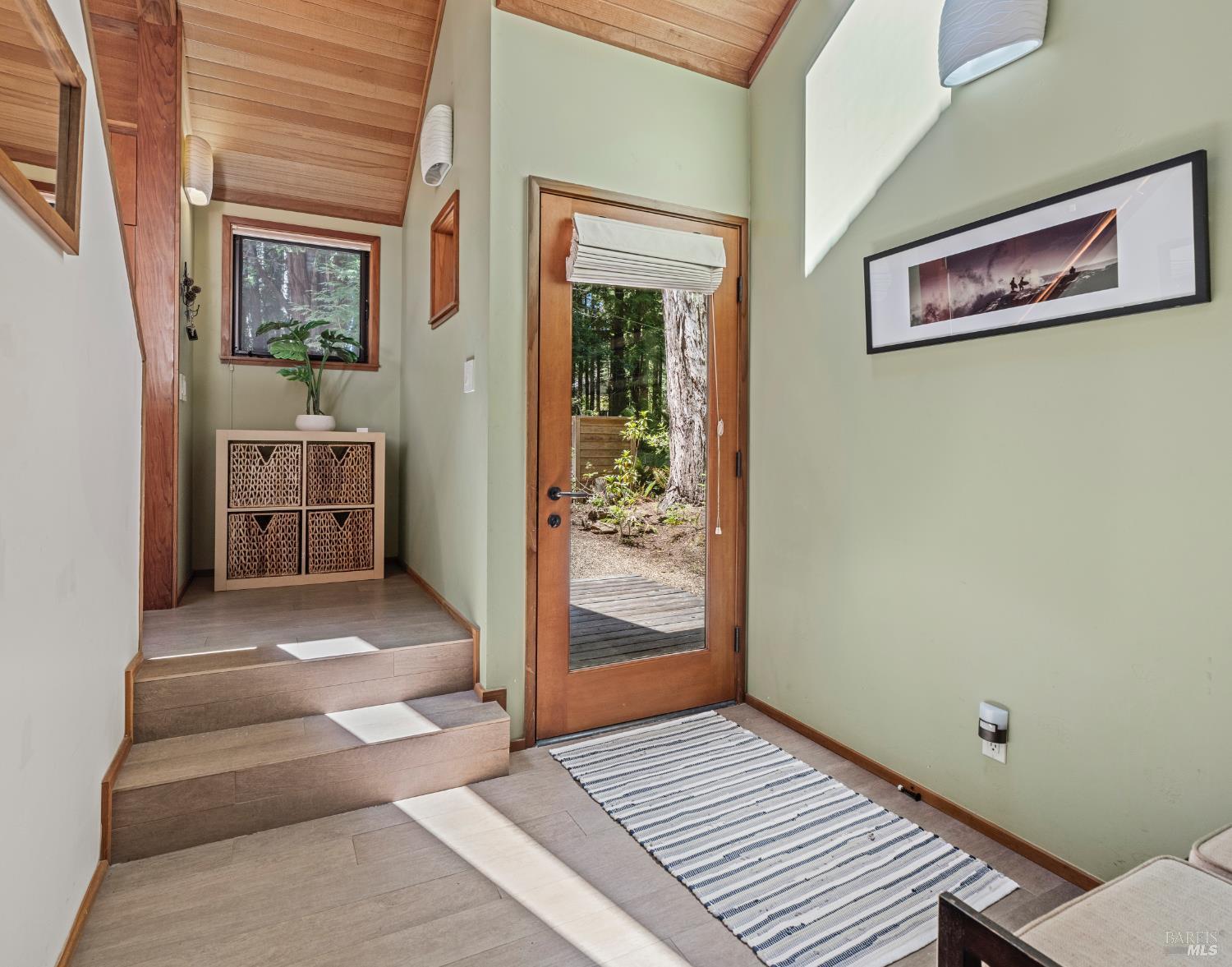 36419 East Ridge Road The Sea Ranch, CA 95497 - Photo 5 of 55 a view of a hallway with wooden floor and cabinet
