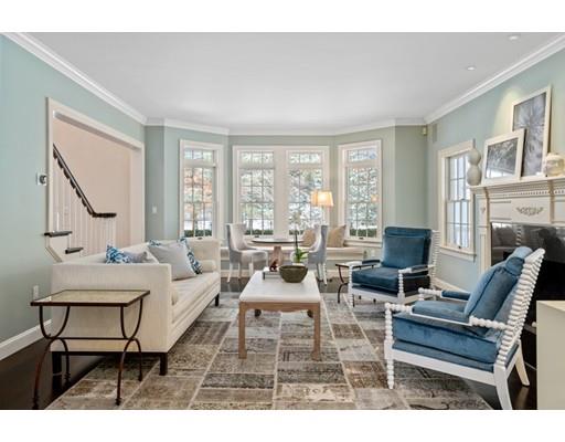 73 Stonecrest Drive Needham, MA 02492 - Photo 3 of 13 a living room with furniture a fireplace and a large window