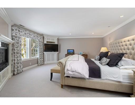 73 Stonecrest Drive Needham, MA 02492 - Photo 9 of 13 a bedroom with furniture and a flat screen tv