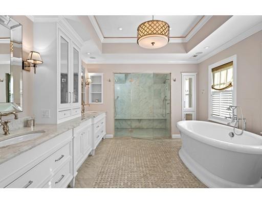 73 Stonecrest Drive Needham, MA 02492 - Photo 10 of 13 a spacious bathroom with a tub sink and mirror