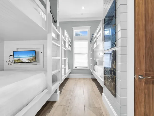 a kitchen with stainless steel appliances a stove a sink and a refrigerator