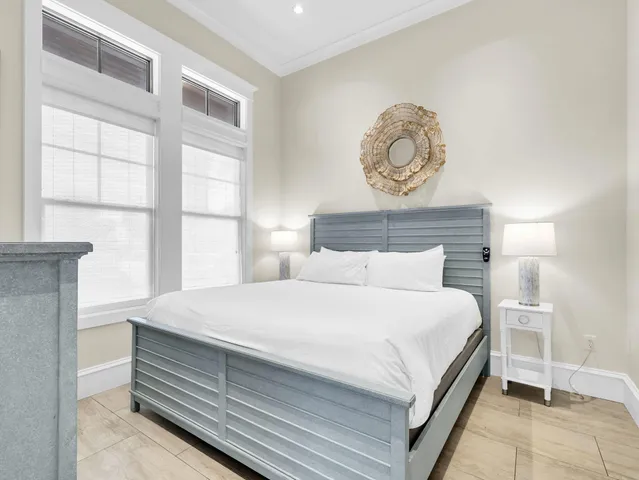 a large kitchen with stainless steel appliances lots of counter space and wooden floor