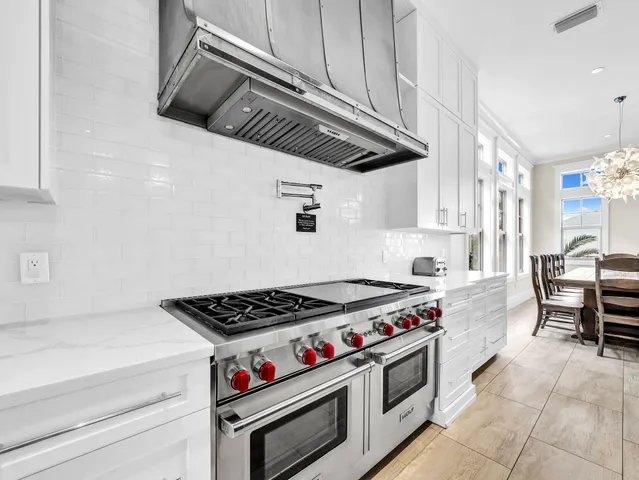a bathroom with a sink double vanity and a mirror