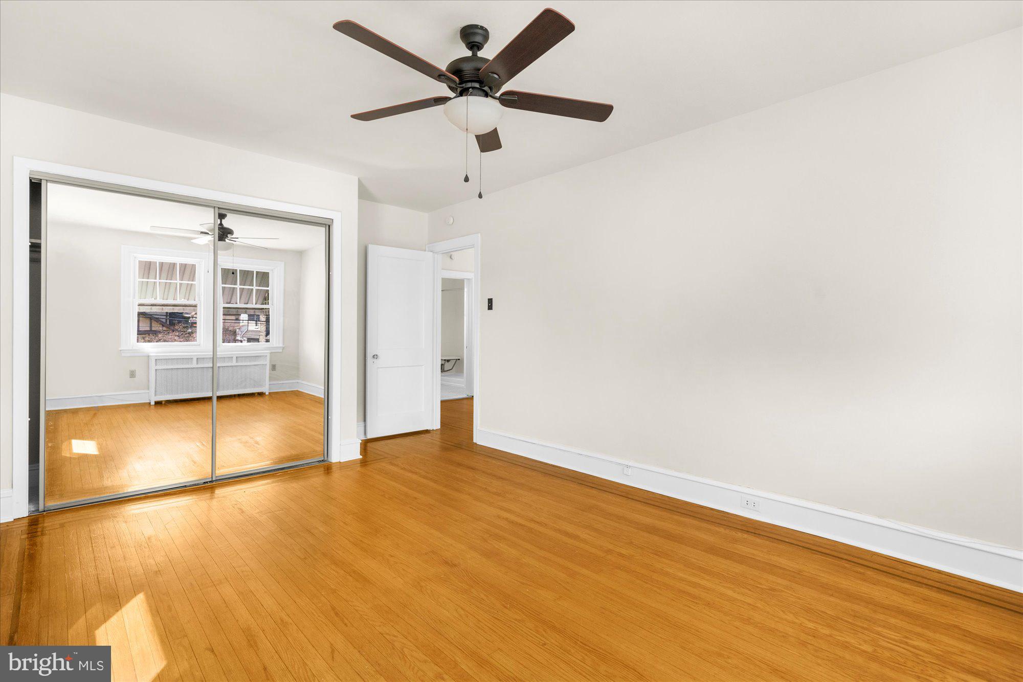 206 North Manoa Road Havertown, PA 19083 - Photo 25 of 50 wooden floor in an empty room with a window