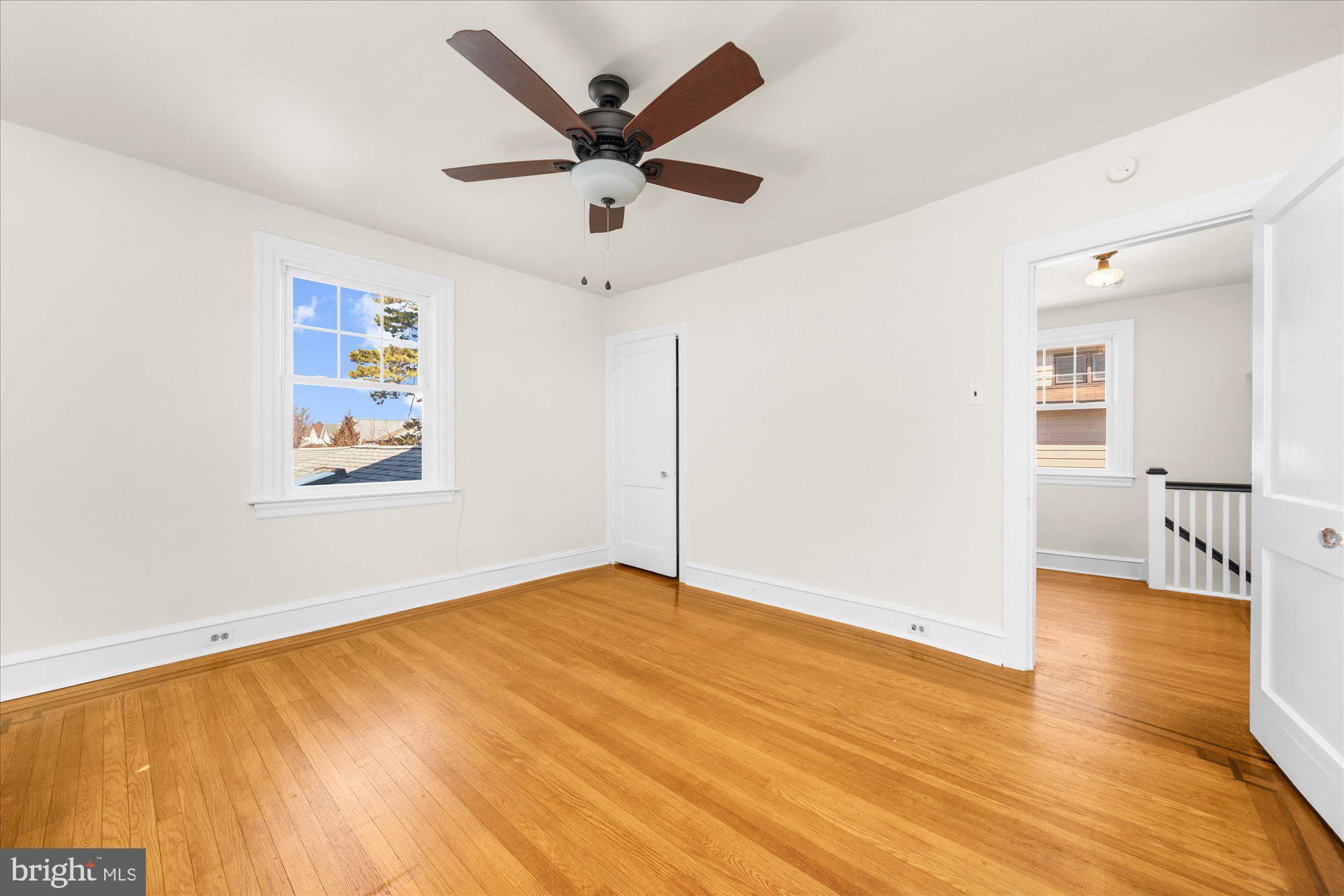 206 North Manoa Road Havertown, PA 19083 - Photo 29 of 50 a view of an empty room with wooden floor