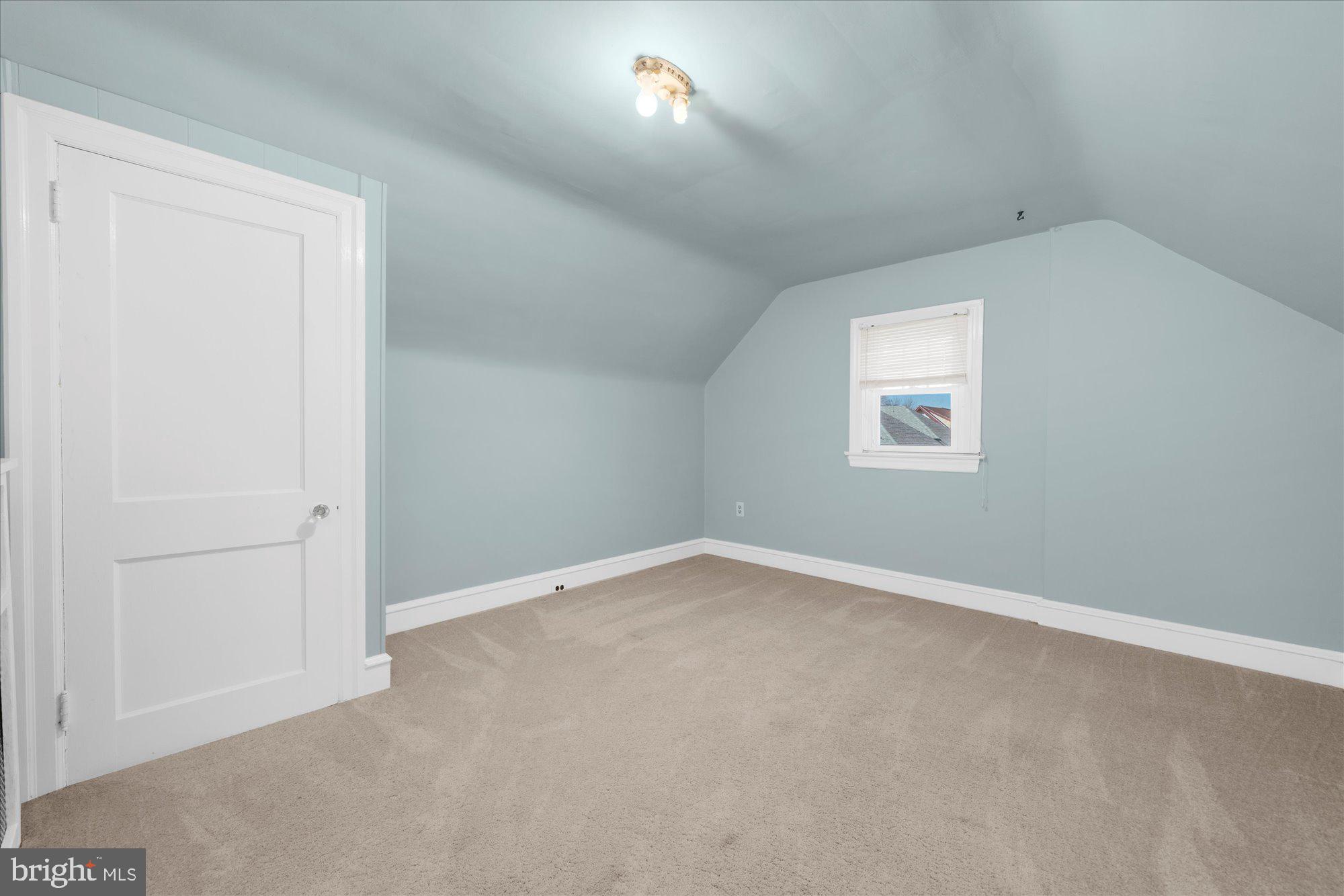 206 North Manoa Road Havertown, PA 19083 - Photo 32 of 50 an empty room with a empty space and a window