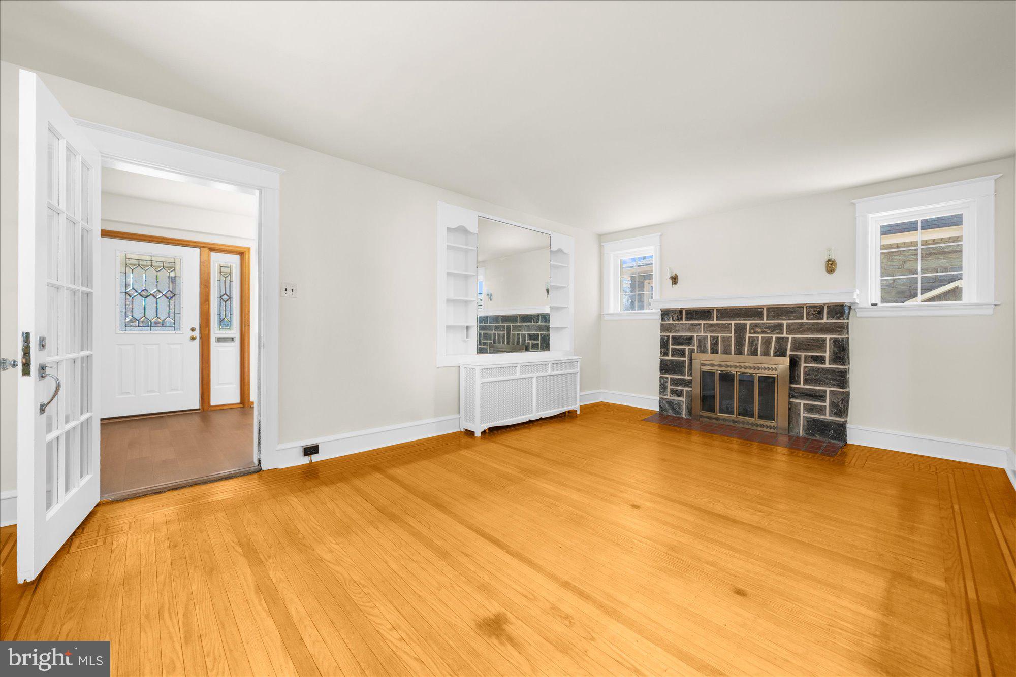 206 North Manoa Road Havertown, PA 19083 - Photo 6 of 50 a view of an empty room with furniture and wooden floor