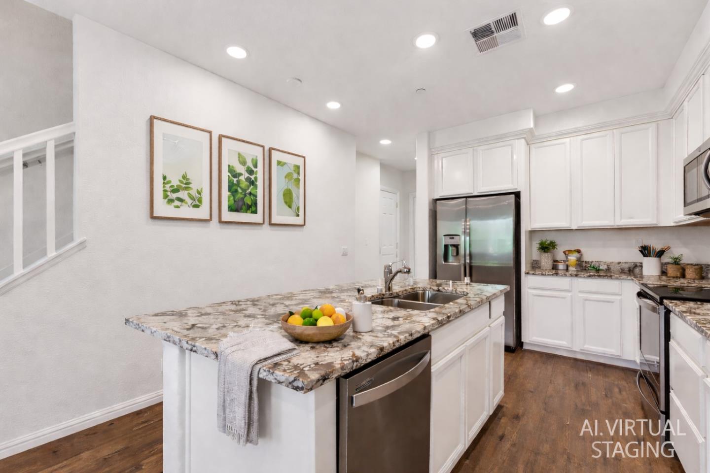 2580 Gimelli Way San Jose, CA 95133 - Photo 18 of 50 a kitchen with a sink a stove a refrigerator and a refrigerator