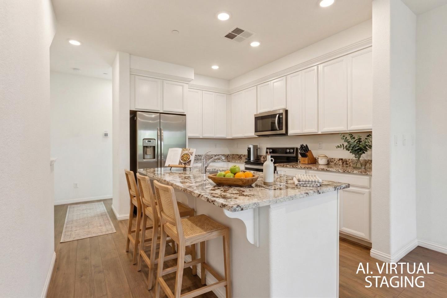2580 Gimelli Way San Jose, CA 95133 - Photo 20 of 50 a kitchen with stainless steel appliances granite countertop a stove a refrigerator a sink a dining table and chairs