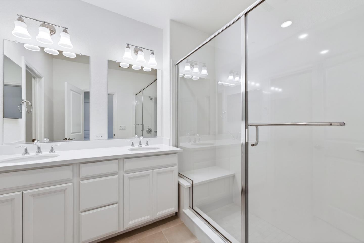 2580 Gimelli Way San Jose, CA 95133 - Photo 30 of 50 a bathroom with a double vanity sink mirror and double