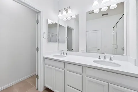 a bathroom with a sink toilet and bathtub