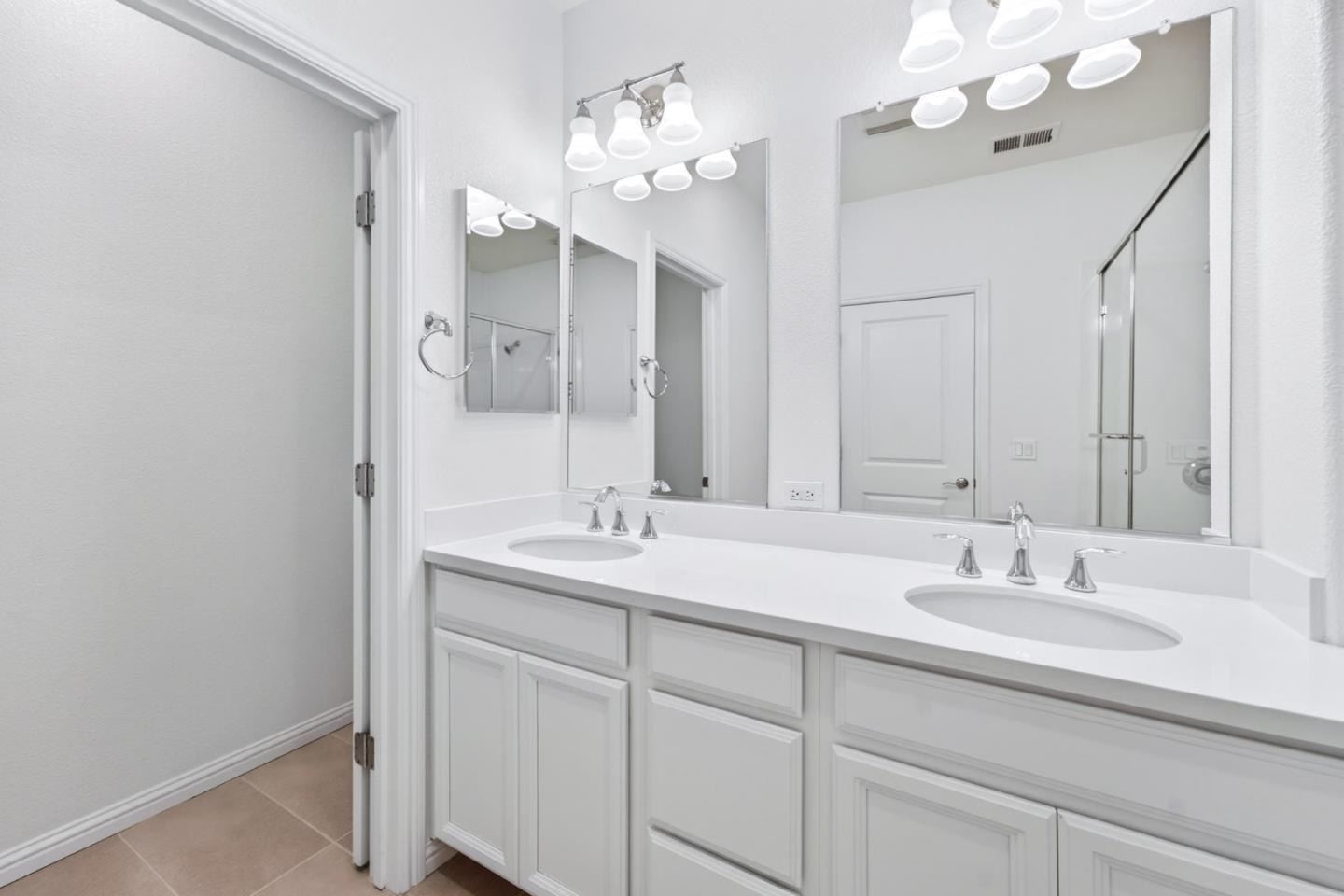 2580 Gimelli Way San Jose, CA 95133 - Photo 31 of 50 a bathroom with a sink double vanity and a mirror