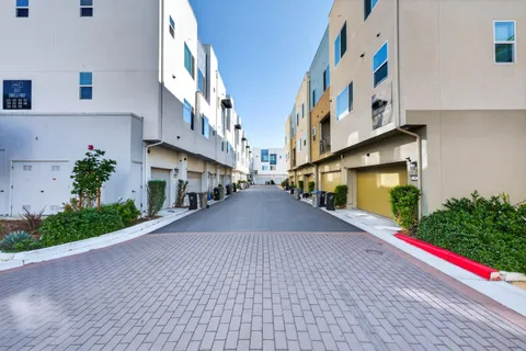 a view of a house with a street