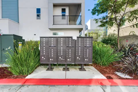 a view of a chairs and table in the patio