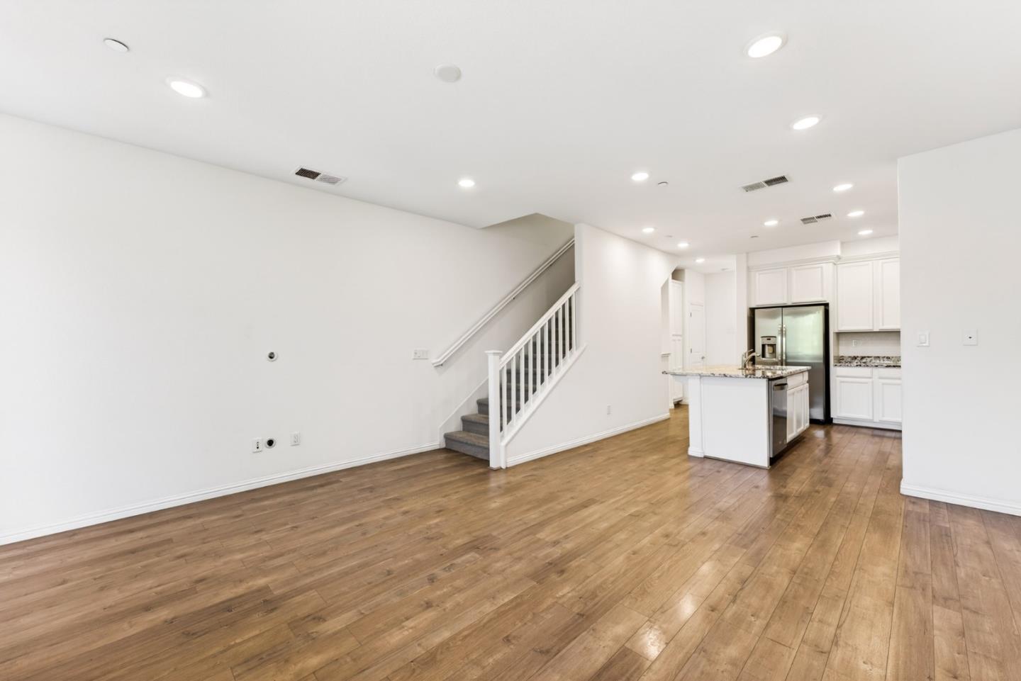 2580 Gimelli Way San Jose, CA 95133 - Photo 10 of 50 a view of an empty room with wooden floor