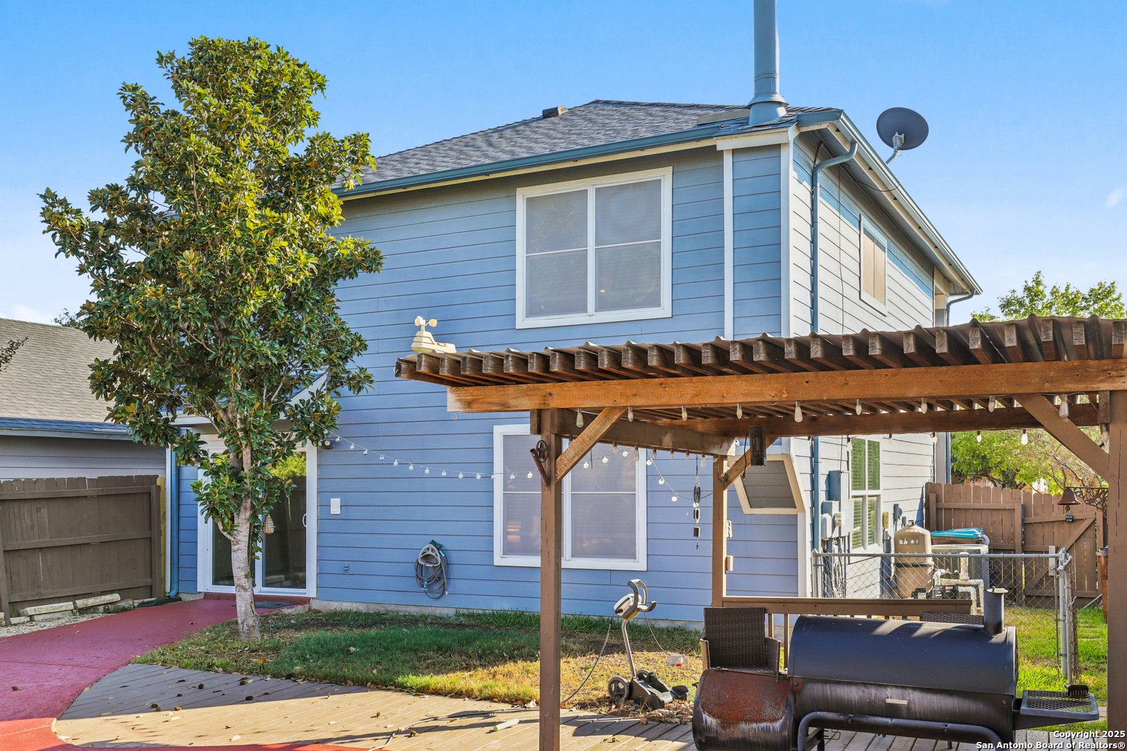 8915 Gathering Pass Converse, TX 78109 - Photo 32 of 37 a front view of a house with garden