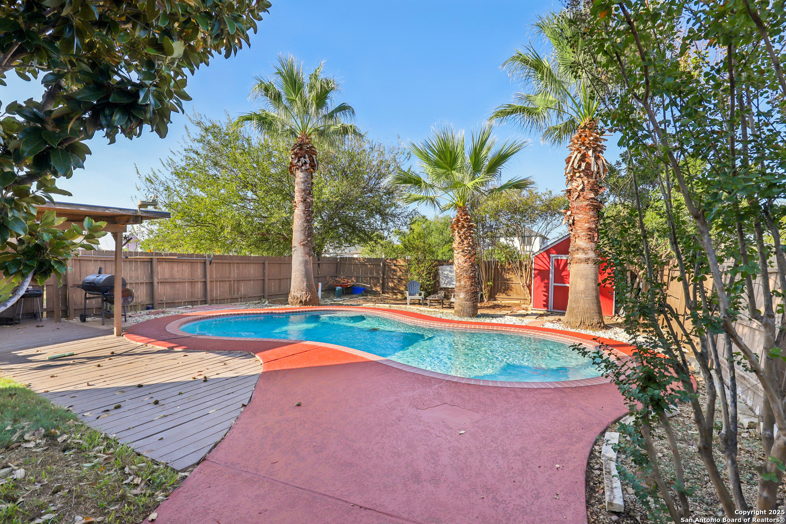 8915 Gathering Pass Converse, TX 78109 - Photo 5 of 37 a view of a backyard with swimming pool