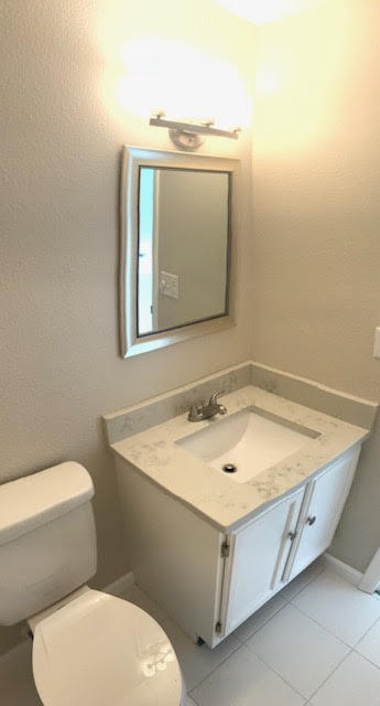 1225 Northwest 21st Street, Unit 912 Stuart, FL 34994 - Photo 11 of 34 Hallway Half Bath Vanity