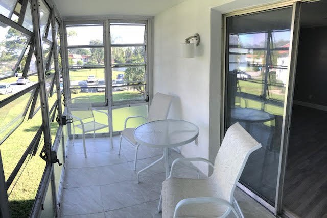 1225 Northwest 21st Street, Unit 912 Stuart, FL 34994 - Photo 17 of 34 Porch
