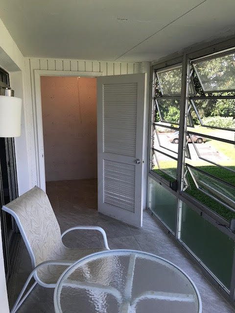 1225 Northwest 21st Street, Unit 912 Stuart, FL 34994 - Photo 20 of 34 Storage Room off Porch